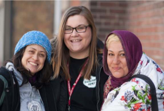 A member of the staff with two clients